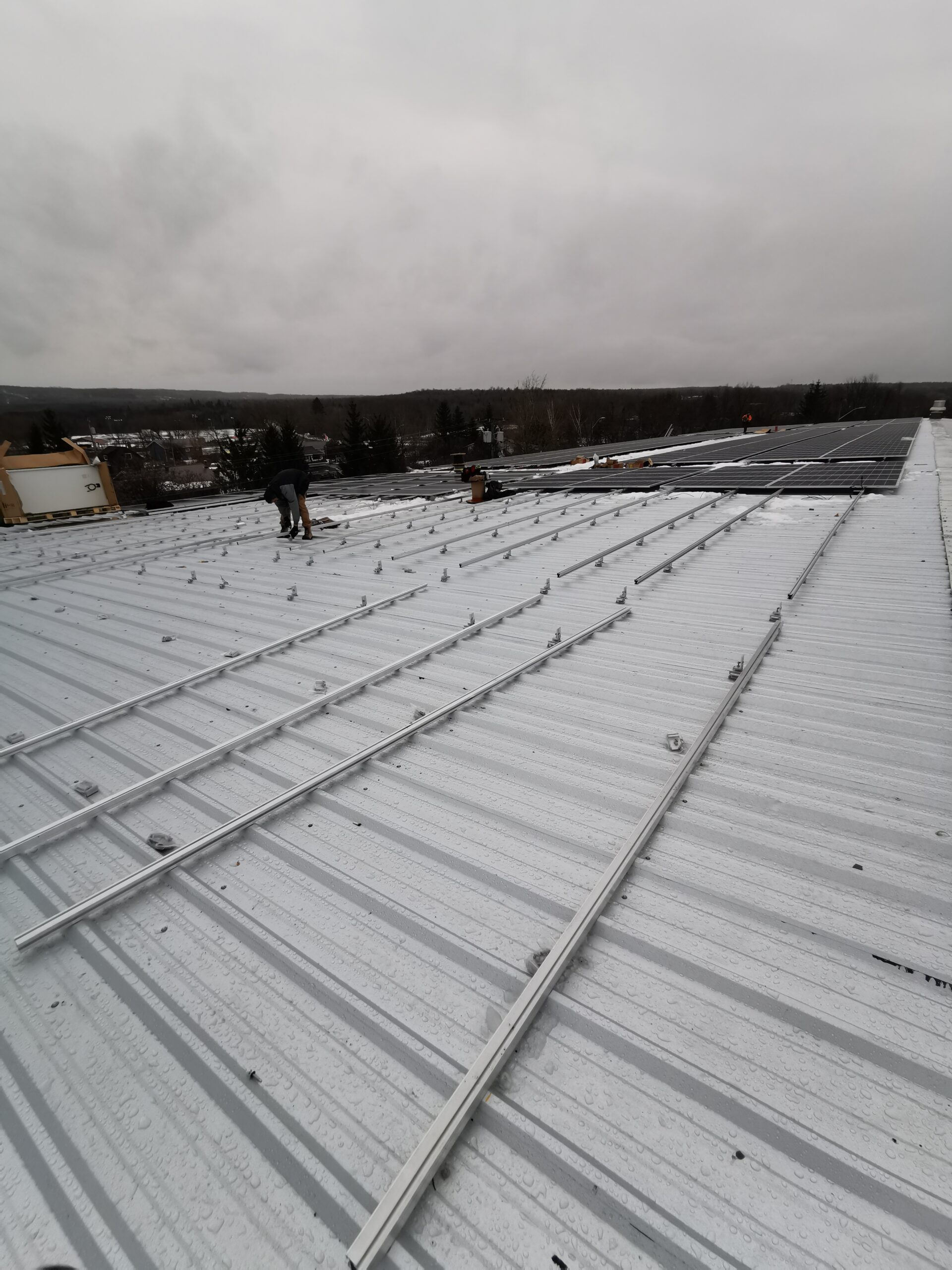 Rooftop solar install in progress